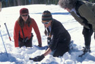 Doing the final search with an avalanche transciever during a clinic on Mt. Shasta.