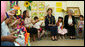 Mrs. Laura Bush joins students at Hand in Hand School for Jewish-Arab Education Wednesday, May 14, 2008, during her visit to Jerusalem. Joining her on the tour of the school that provides integrated, bilingual education to Jewish and Arab students in Israel is Mrs. Aliza Olmert, spouse of Israeli Prime Minister Ehud Olmert. White House photo by Shealah Craighead