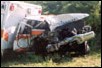Crash  photo showing emergency  vehicle after crash.