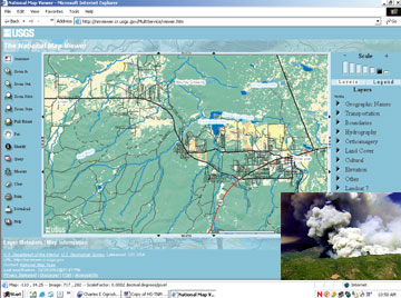 A screen shot of a map display with insert of a color photograph of a fire.