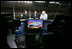 Vice President Dick Cheney talks with Chris Myers, left, and Jeff Hammond, center, of Fox Sports Network, Saturday, July 1, 2006, during a live TV interview held during the 2006 Pepsi 400 NASCAR race at Daytona International Speedway in Daytona, Fla.