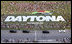 The motorcade of Vice President Dick Cheney takes a lap around the Daytona International Speedway in Daytona, Fla., Saturday, July 1, 2006, before the start of the 2006 Pepsi 400 NASCAR race.