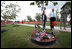 Vice President Dick Cheney tours the “Warriors Walk,” a living memorial of Eastern Redbud trees dedicated to the fallen soldiers assigned to the 3rd Infantry Division who served in Operation Iraqi Freedom, as part of his visit to Fort Stewart, Ga., Friday, July 21, 2006.