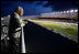 Vice President Dick Cheney watches the 2006 Pepsi 400 NASCAR race Saturday, July 1, 2006, from the infield at Daytona International Speedway in Daytona, Fla.