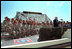 Vice President Dick Cheney addresses troops from the Arkansas National Guard in Sharm El-Sheikh, Egypt, March 13, 2002. "You, and everyone around you, are doing your duty and reflecting credit on yourselves, your families, and your country," said the vice president during a speech at the airbase. "You're here because you believe in America, and America believes in you."