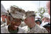 Vice President Dick Cheney shakes hands and signs autographs with U.S. Marines during a rally at Camp Lejeune in Jacksonville, NC, Monday October 3, 2005.