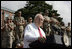 Vice President Dick Cheney addresses an estimated crowd of 4,500 Marines during a rally at Camp Lejeune in Jacksonville, NC, Monday October 3, 2005. During his remarks the vice president commended the Marines and said, "All of you are part of a team that continues to make history, removing threats to the United States and other free nations, and bringing new hope to a troubled region of the world. As a Marine, each of you defends this country, and represents the best that is in it. And by your achievements you've made one thing very clear: The day you decided to become a Marine was a great day for the United States of America."