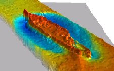 3-D picture of underwater wreck sitting on ocean bottom created from data collected from multibeam sonar