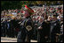 An U.S. Army Band bugler plays Taps during a wreath-laying ceremony at the Tomb of the Unknown Soldier, Sunday, Nov. 11, 2007, at Arlington National Cemetery in Arlington, Va.