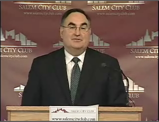 Chief Justice Paul J. De Muniz presenting 2009 State of the Courts