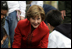 Mrs. Laura Bush helps children plant flowers at the First Bloom Event, Monday, April 21, 2008, during her visit to celebrate National Park week at the Castle Clinton National Monument in New York City.