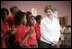 Mrs. Laura Bush thanks students for their applause as she is introduced during her visit with President George W. Bush to the Dr. Martin Luther King Jr. Charter School for Science and Technology,Wednesday, Aug. 29, 2007, in New Orleans.