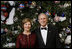 President George W. Bush and Mrs. Laura Bush pose for their 2008 holiday portrait Sunday, Dec. 7, 2008, in the Blue Room of the White House.