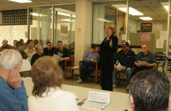 Niki discusses the benefits of the economic stimulus package for seniors with Lowell Housing Authority residents