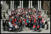 Laura Bush stands with country singer LeAnn Rimes, actor LeVar Burton and representatives of the Children's Miracle Network on the steps of the Dwight D. Eisenhower Executive Office Building near the White House Friday, March 18, 2005.