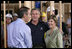 NBC "Today Show" host Matt Lauer talks with President George W. Bush and Laura Bush Tuesday, Oct. 11, 2005, on the construction site of a Habitat for Humanity home in Covington, La., a hurricane-devastated town just north of New Orleans where the nonprofit is building houses for those displaced by Katrina.