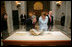 President George W. Bush and Laura Bush tour the National Archives in Washington, D.C., Wednesday, Jan. 19, 2005. National Archives Senior Curator Stacy Bredhoff, left, and National Archivist John Carlin, right, escorted the Bushes during their visit.