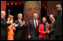 Secretary of State Colin Powell and his wife Alma are accompanied by President George W. Bush and Mrs. Laura Bush while the Powell's received the John Thompson Legacy of a Dream Award from Georgetown University during the University's "Let Freedom Ring" celebration honoring Dr. Martin Luther King, Jr. at the Kennedy Center for the Performing Arts on Monday, January 17, 2005.