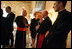 Laura Bush talks with American cardinals, archbishops and bishops during a reception at the Villa Taverna in Rome April 7, 2005.