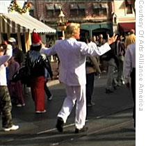 Reverend Billy takes his stop shopping message to Disneyland's Main Street