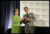 Mrs. Laura Bush is presented with The National Italian American Foundation’s Special Achievement Award in Literacy from NIAF Chairman Dr. Ken Ciongoli, Friday, Oct. 12, 2007, in Washington, D.C.