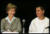 Laura Bush talks with Freddy Martinez, 17, during a roundtable discussion on stopping violent crime in Chicago on June 2, 2005. CeaseFire Chicago is a public health initiative that works with community partners to reduce violence.