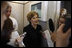 Mrs. Laura Bush speaks with members of the press June 13, 2008 aboard Air Force One, as she and President Bush travel from Rome to Paris on their multi-city European visit.