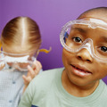 Kids age 5-7 wearing safety goggles.