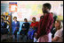 Mrs. Laura Bush and Ms. Jenna Bush meet with the educators and students at Regiment Basic School Thursday, June 28, 2007, in Lusaka, Zambia. Of the 1,200 students at the school, 300 are orphans. After meeting with students and watching skits and song performances, Mrs. Bush addressed the press saying, “I just met with a group of girls who are receiving scholarships, some of them are orphan girls, orphans because their parents died of AIDS, and they’re receiving scholarships from PEPFAR, the President’s Emergency Plan for AIDS relief.” 