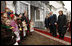 President George W. Bush and Mrs. Laura Bush, joined by Ukrainian President Viktor Yushchenko and his wife, first lady Kateryna Yushchenko, are greeted by children, April 1, 2008, before touring St. Sophia's Cathedral in Kyiv, Ukraine.