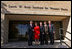 Mrs. Bush shakes hands with Chancellor Kent Hance, Texas Tech University System, as she stands with Dr. Marjorie Jenkins, Erin Thurston and Dr. John Baldwin in front of the Laura W. Bush Institute for Women's Health at TTU, Amarillo Campus Wednesday, Nov. 7, 2007, in Amarillo, Texas.