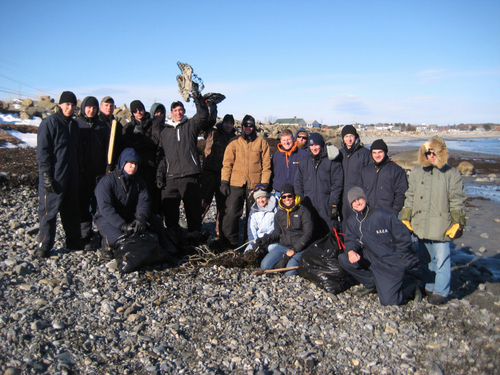Photo of the crew from the Coast Guard Cutter Reliance gathering together after collecting 140 pounds of trash from Ragged Neck State Park in Rye, N.H. (U.S. Coast Guard photo)