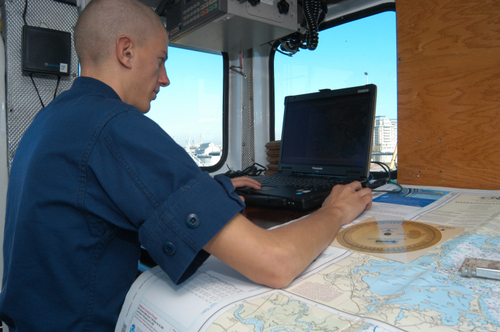 Photo of Seaman Casey Todd, a crewman of the watch aboard Coast Guard Cutter Pendant using Vega, a new navigational system aboard Coast Guard cutters. Vega is the Coast Guard's eventual replacement for all existing shipboard electronic navigation software. (Coast Guard photo/ Seaman Sabrina Elgammal)