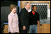 President George W. Bush and Mrs. Laura Bush greet student Michael Harrell during a visit with science and engineering students at the Yvonne A. Ewell Townview Magnet Center in Dallas, Texas, Friday, Feb. 3, 2006.