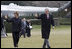 President George W. Bush and Laura Bush arrive on the South lawn at the White House returning from delivering remarks on the 2006 agenda in Nashville, Tennessee, Wednesday, Feb. 1, 2006.