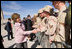 Mrs. Laura Bush greets base personnel from Kirtland Air Force Base Friday, Feb. 3, 2006, before departing Albuquerque for Dallas.