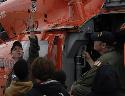 Coast Guard Air Station New Orleans crewmembers talk to local students