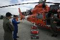 Coast Guard Air Station New Orleans crewmembers talk shop with NOAA pilot