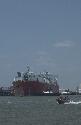 Photograph of: Coast Guard patrol boat passes in front of first LNG Ship to arrive in Freeport (3)