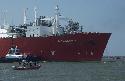 Photograph of: Coast Guard patrol boat passes in front of first LNG Ship to arrive in Freeport (1)