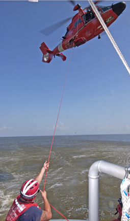 Air Station conducts rescue basket hoist trng