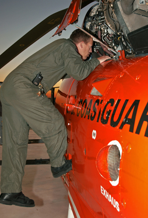 Air Station crewmember inspects helo