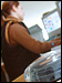 Woman seated at computer workstation