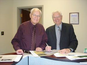 photo: Authors of 'Pusuing What is Best for the World,' Kenneth VerBurg and Raymond Vlasin