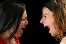 two girls arguing face to face