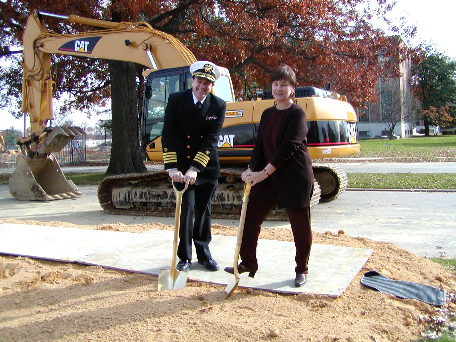 CDER Deputy Director Steven Galson, M.D., and CDER Director Janet Woodcock, M.D., pose at the groundbreaking site for the new CDER Office Building.