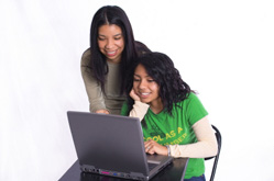 mother and daughter at computer