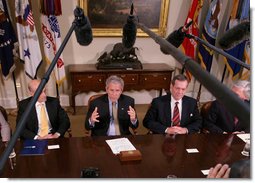 President George W. Bush gestures as he speaks to members of the media Wednesday, July 18, 2007 in the Roosevelt Room at the White House, following a meeting with the Import Safety working group, where President Bush announced an updated review of the food safety regulations and inspection procedures will be conducted to ensure the nation's food supply remains the safest in the world. White House photo by Eric Draper