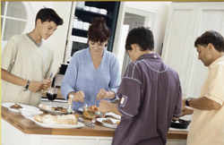 a family preparing a meal