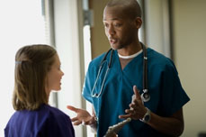 school nurse talks to student